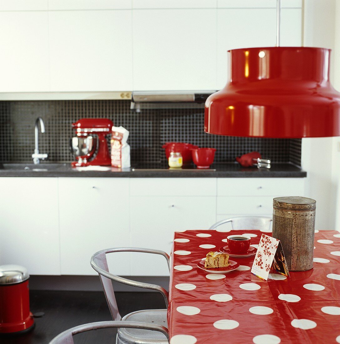 Kitchen table with a cup of coffee and cake