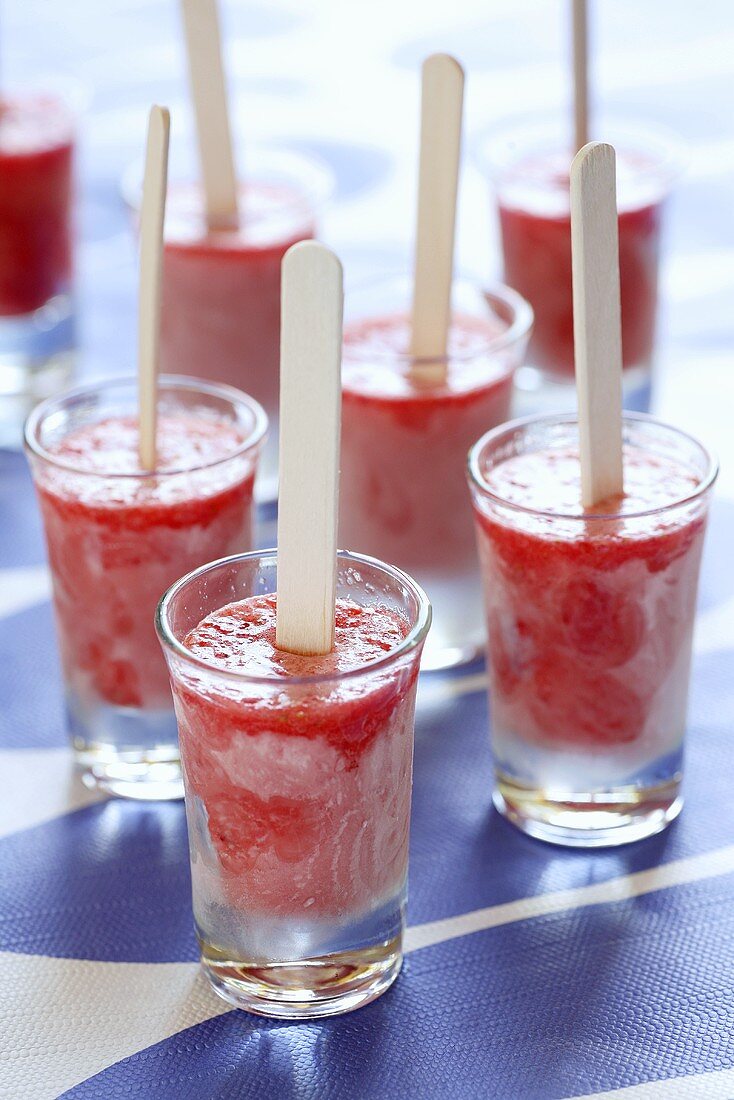 Home-made strawberry ice lollies