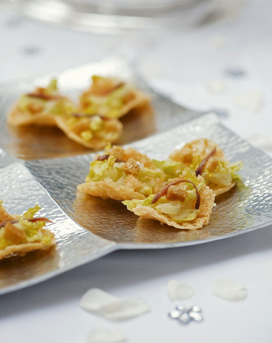 Caesar salad on Parmesan crisps (appetisers)