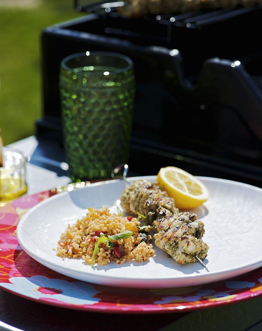 Grilled monkfish kebab with couscous in the open air