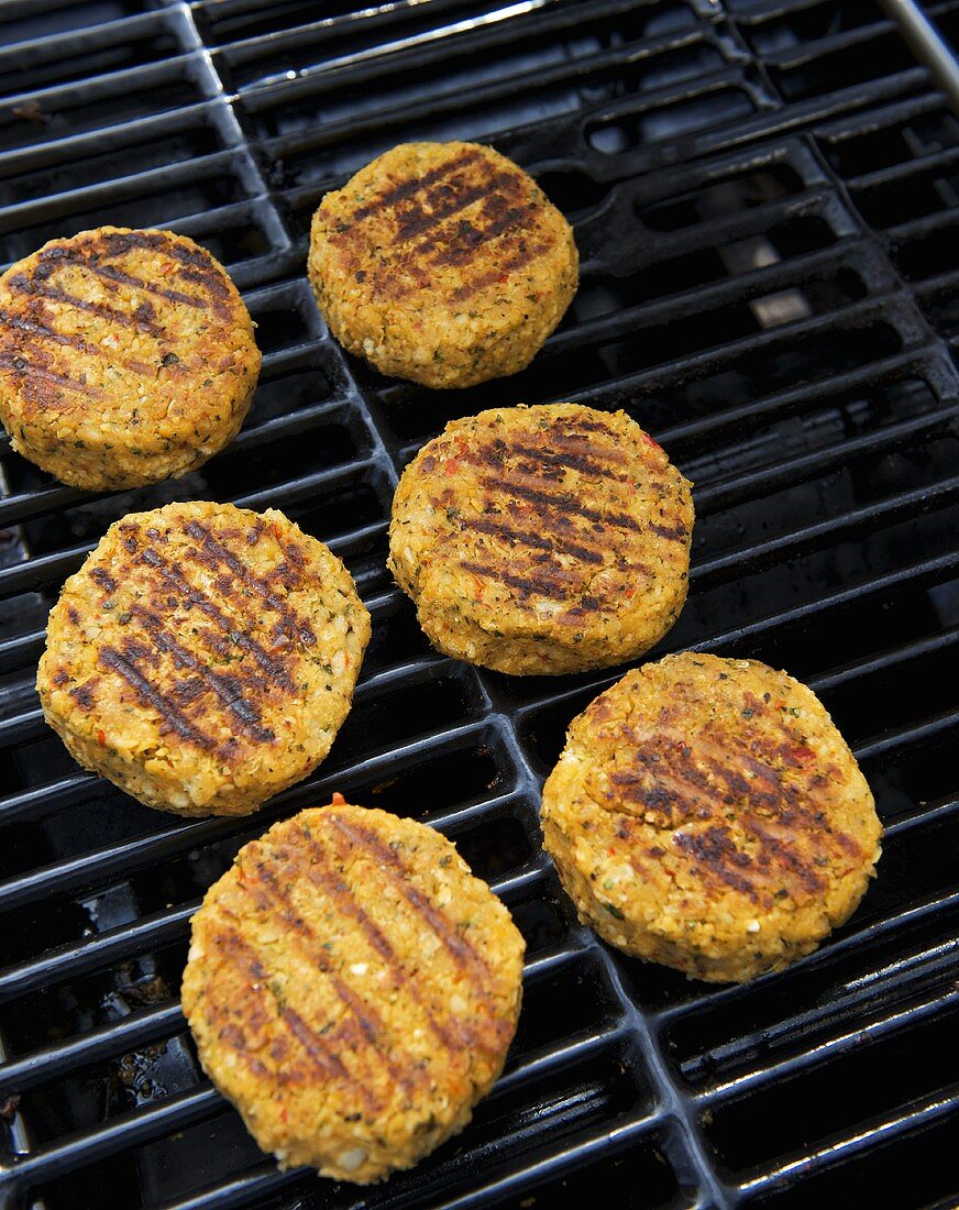 Chick-pea burgers on a grill