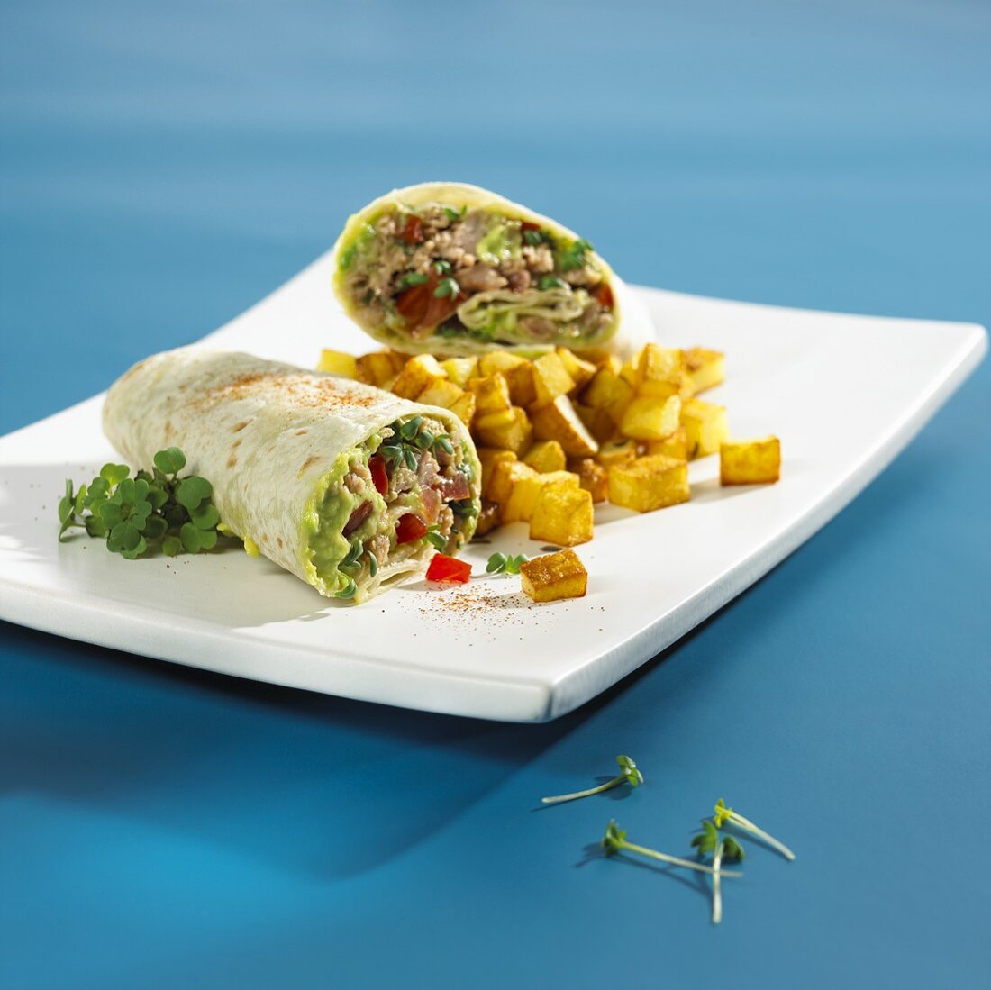 Tuna and avocado wrap with fried diced potatoes