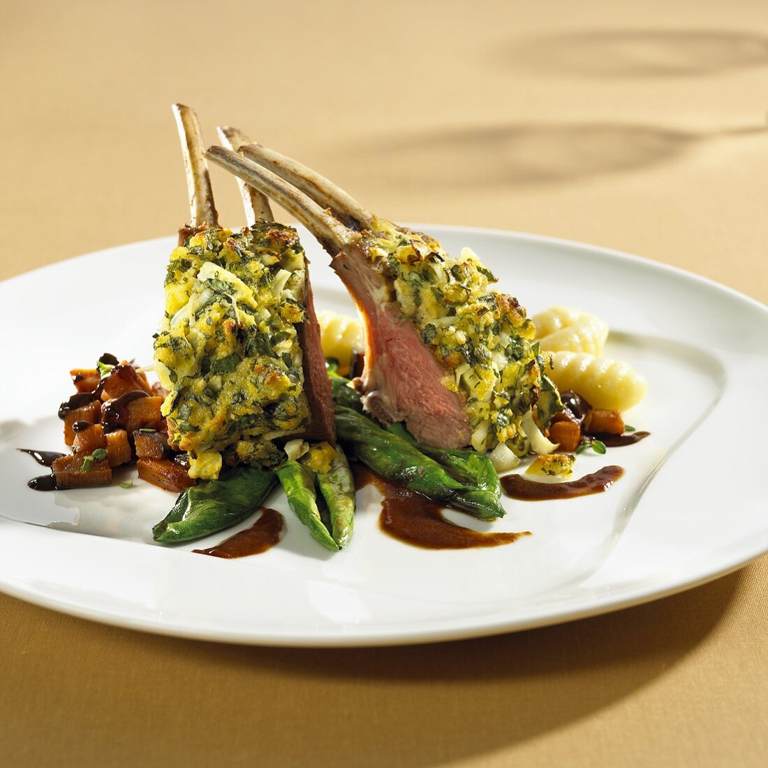 Rack of lamb with aubergines and chocolate sauce