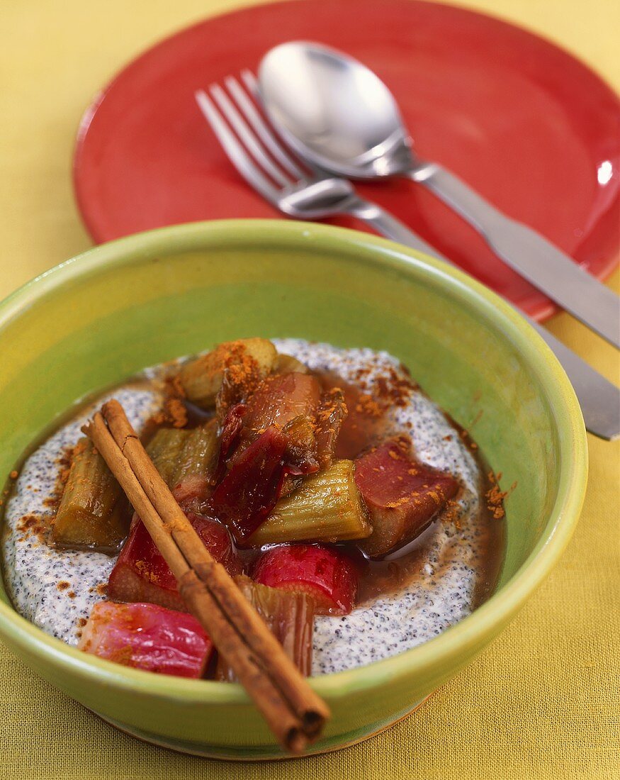 Rhubarb compote with cinnamon on poppy seed cream in a dish