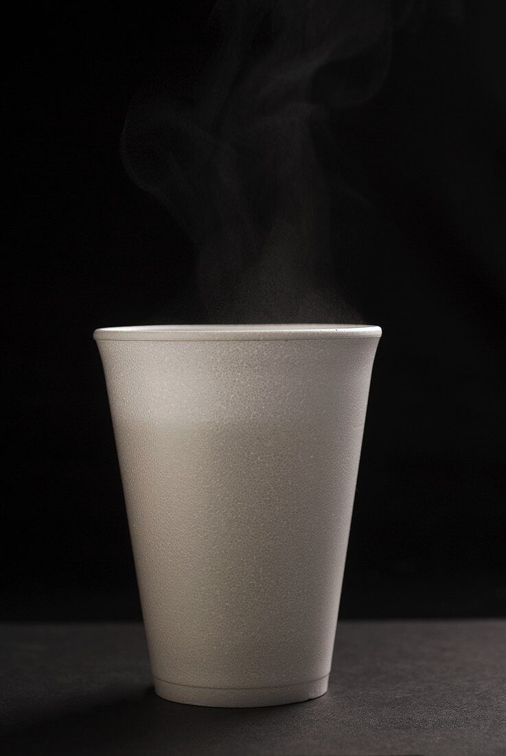 Steaming coffee in a plastic cup