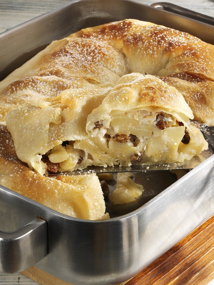 Apple strudel in a roasting tin