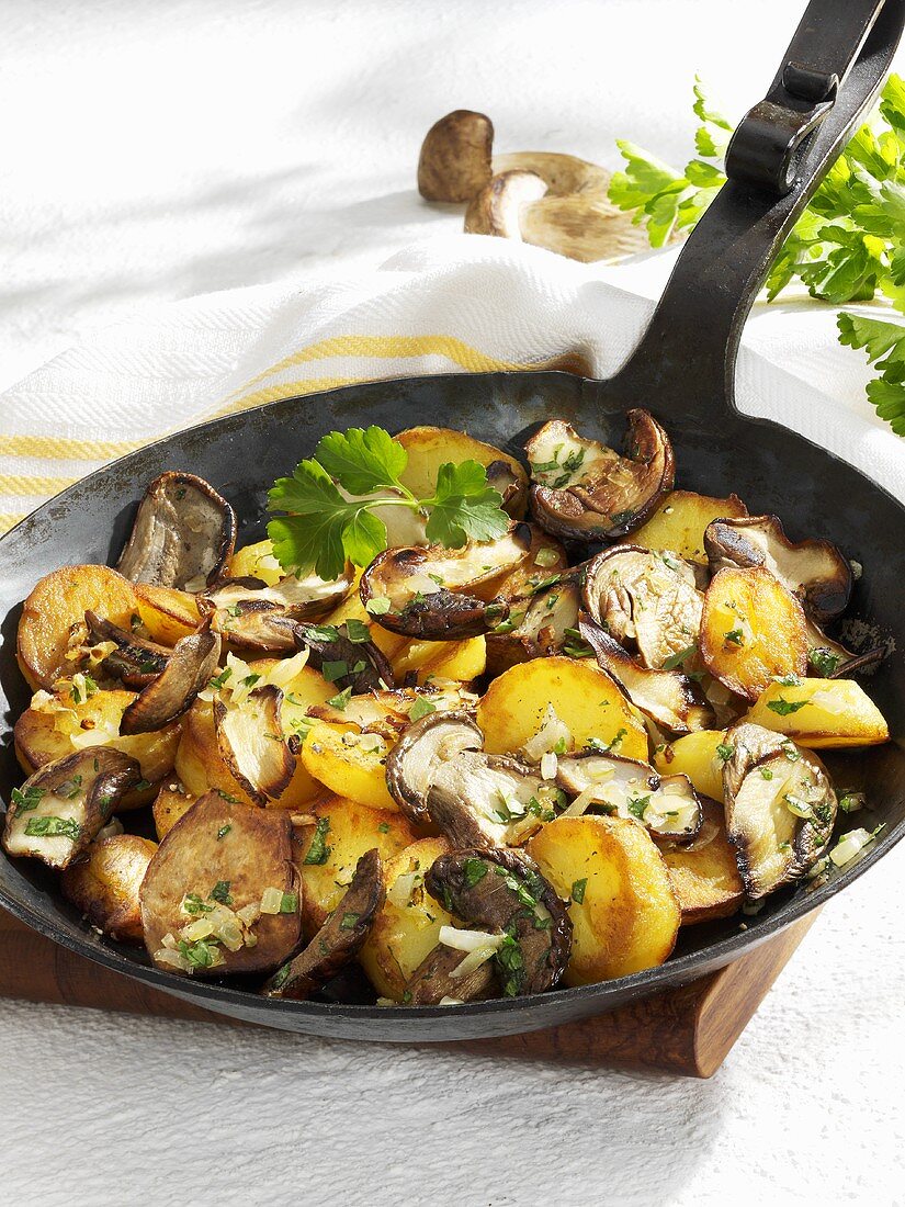 Cep and potato hash in a cast-iron frying pan