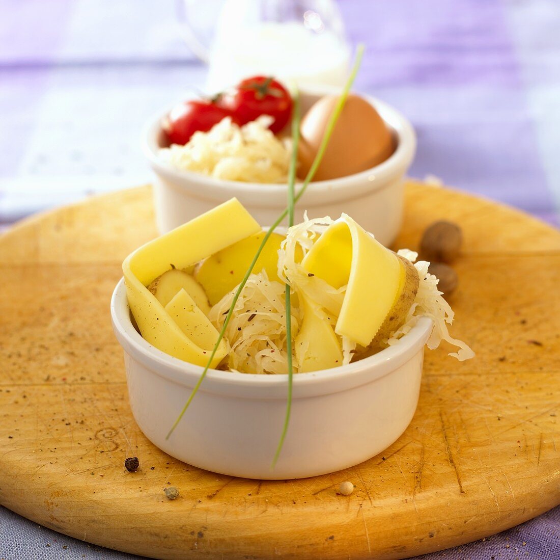 Zutaten: Sauerkraut, Kartoffeln, Käse, Ei, Milch, Tomaten