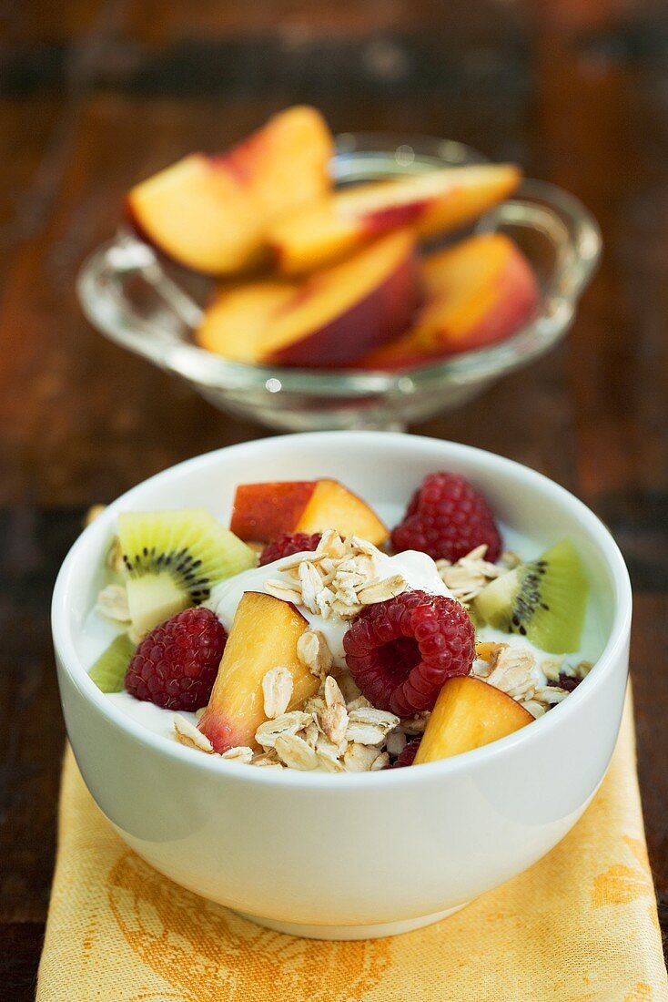 Yoghurt with muesli and fresh fruit