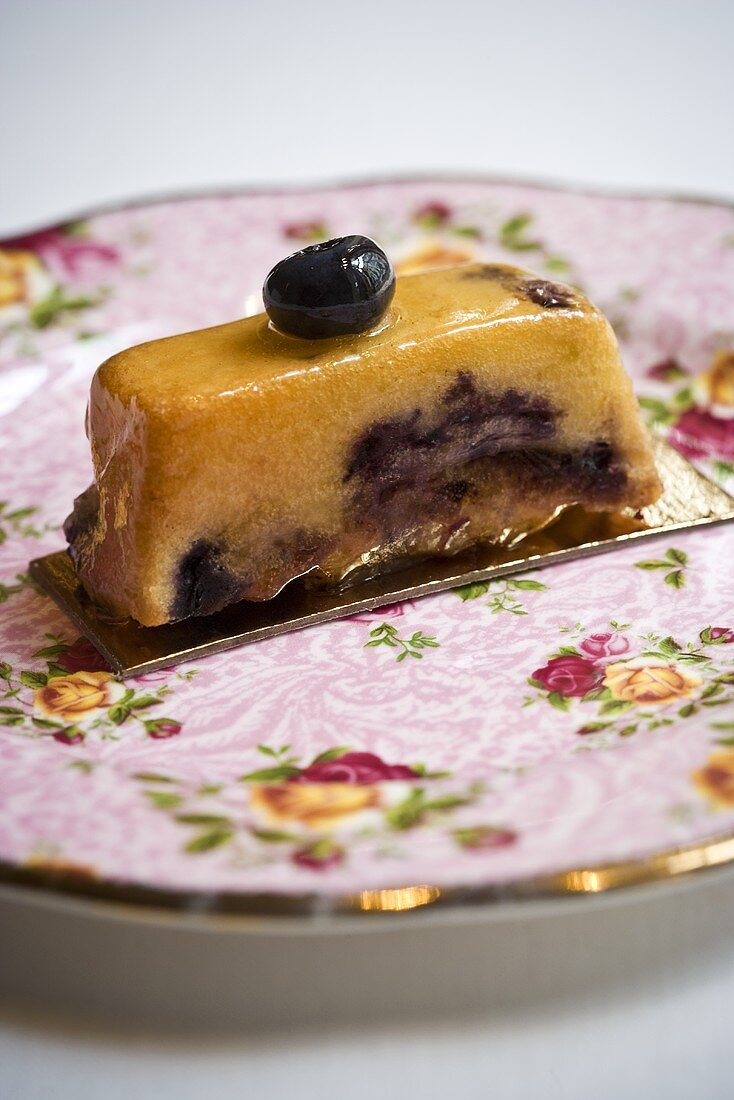 Piece of olive oil blueberry cake