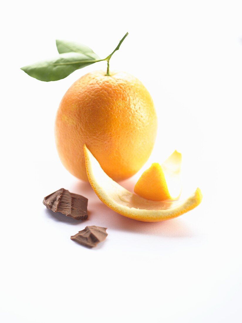 An orange, orange peel and chocolate
