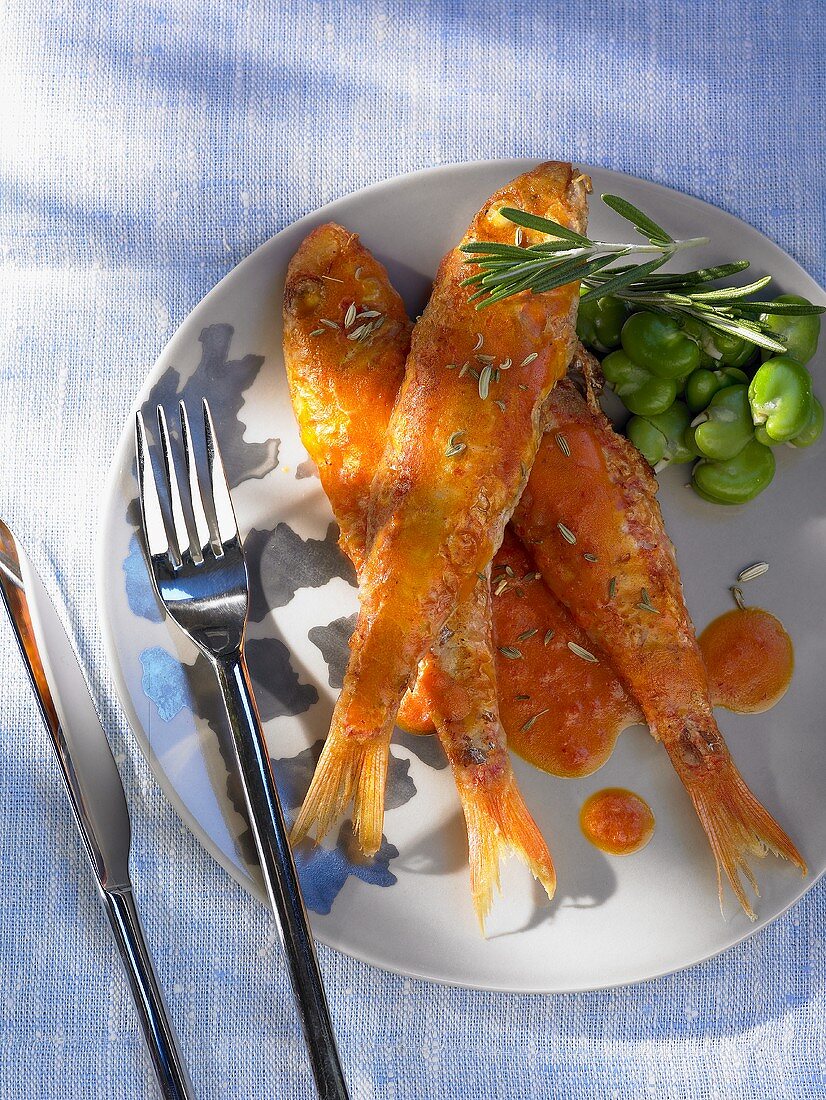 Red mullet in paprika sauce with broad beans