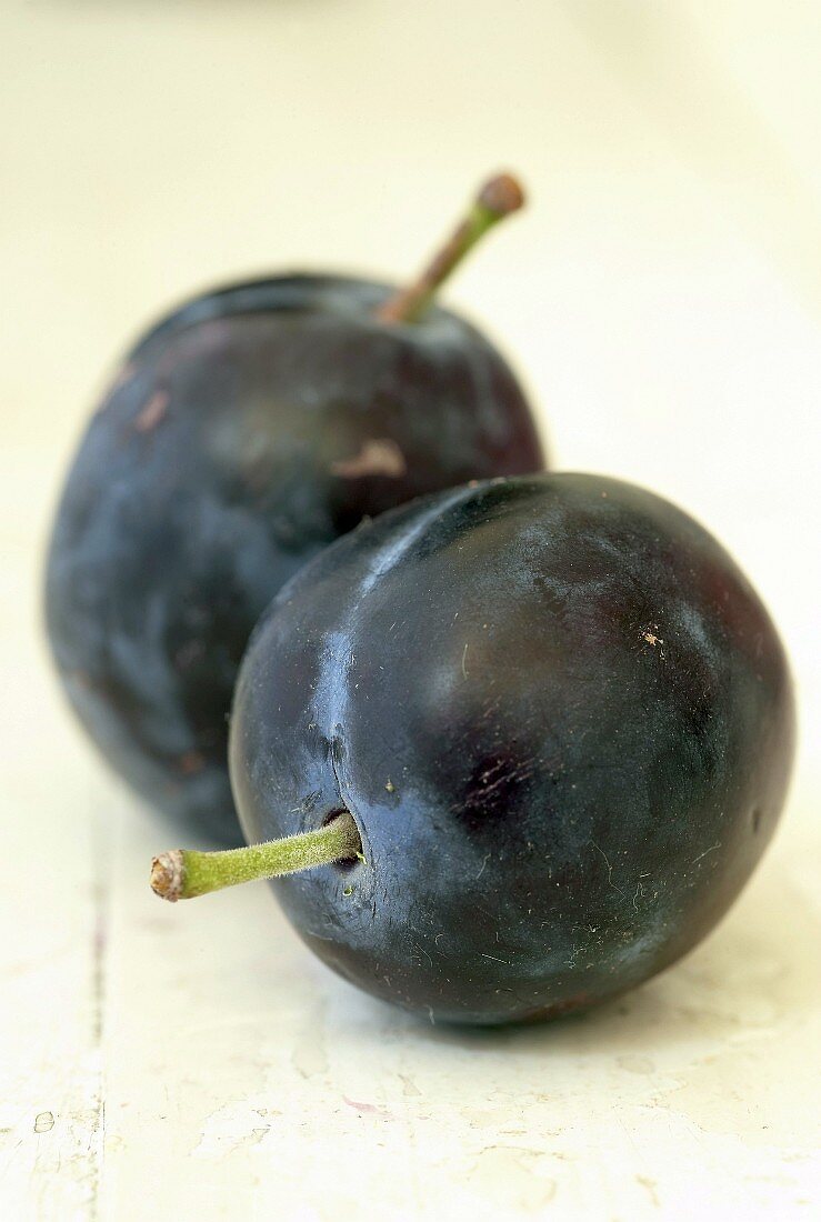 Two purple plums
