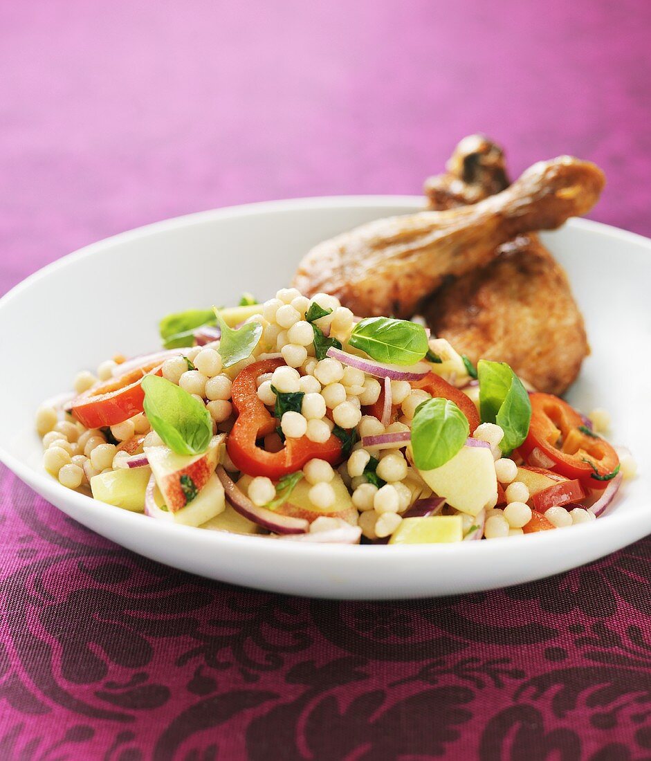 Grilled chicken legs with couscous salad
