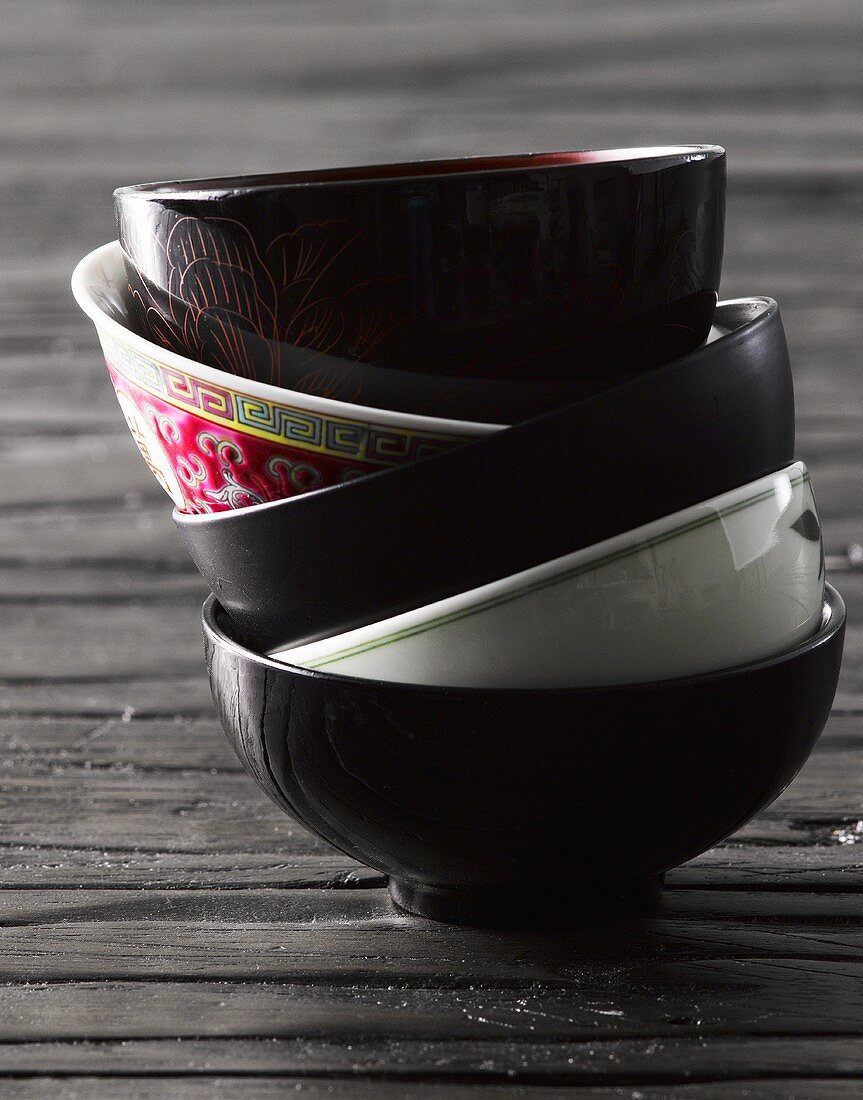 Five Asian food bowls, stacked