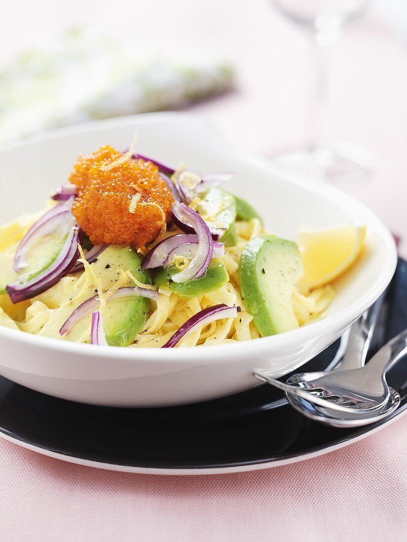 Pasta with avocado, onion and whitefish roe