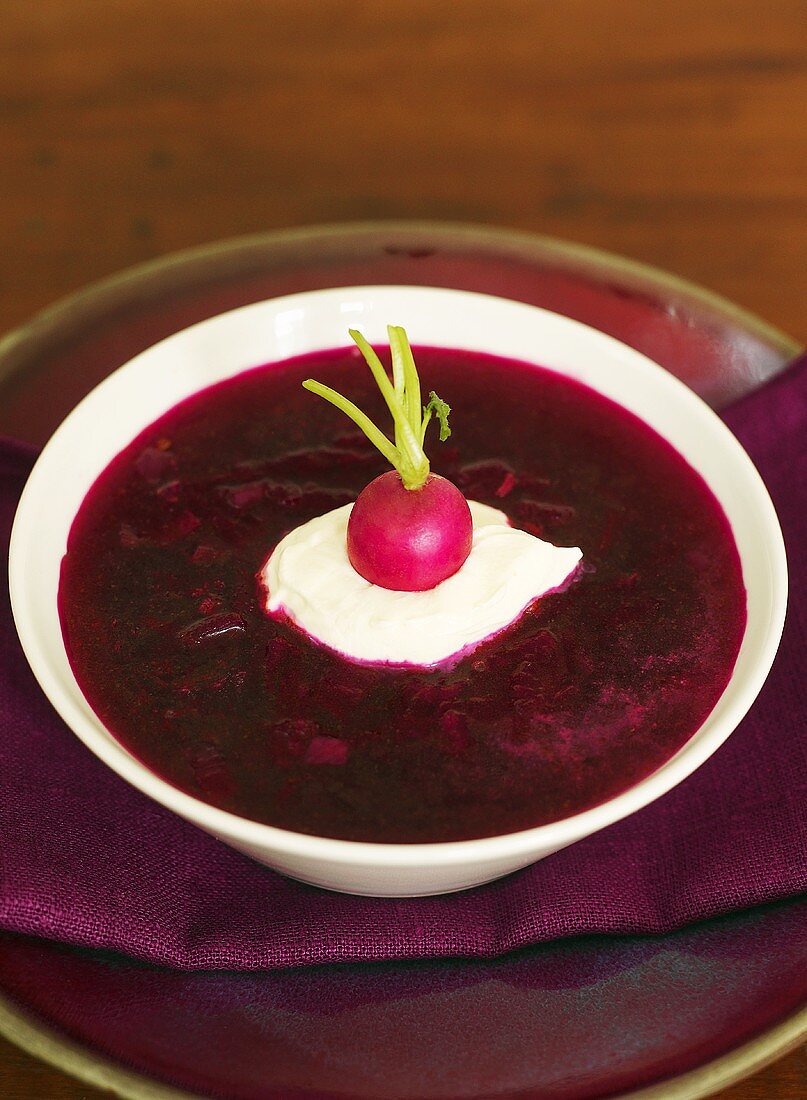 Beetroot soup with crème fraîche and radish