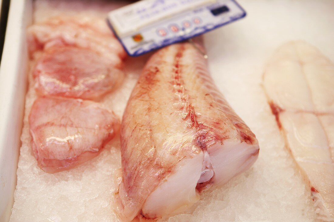 Part of a fresh monkfish on crushed ice