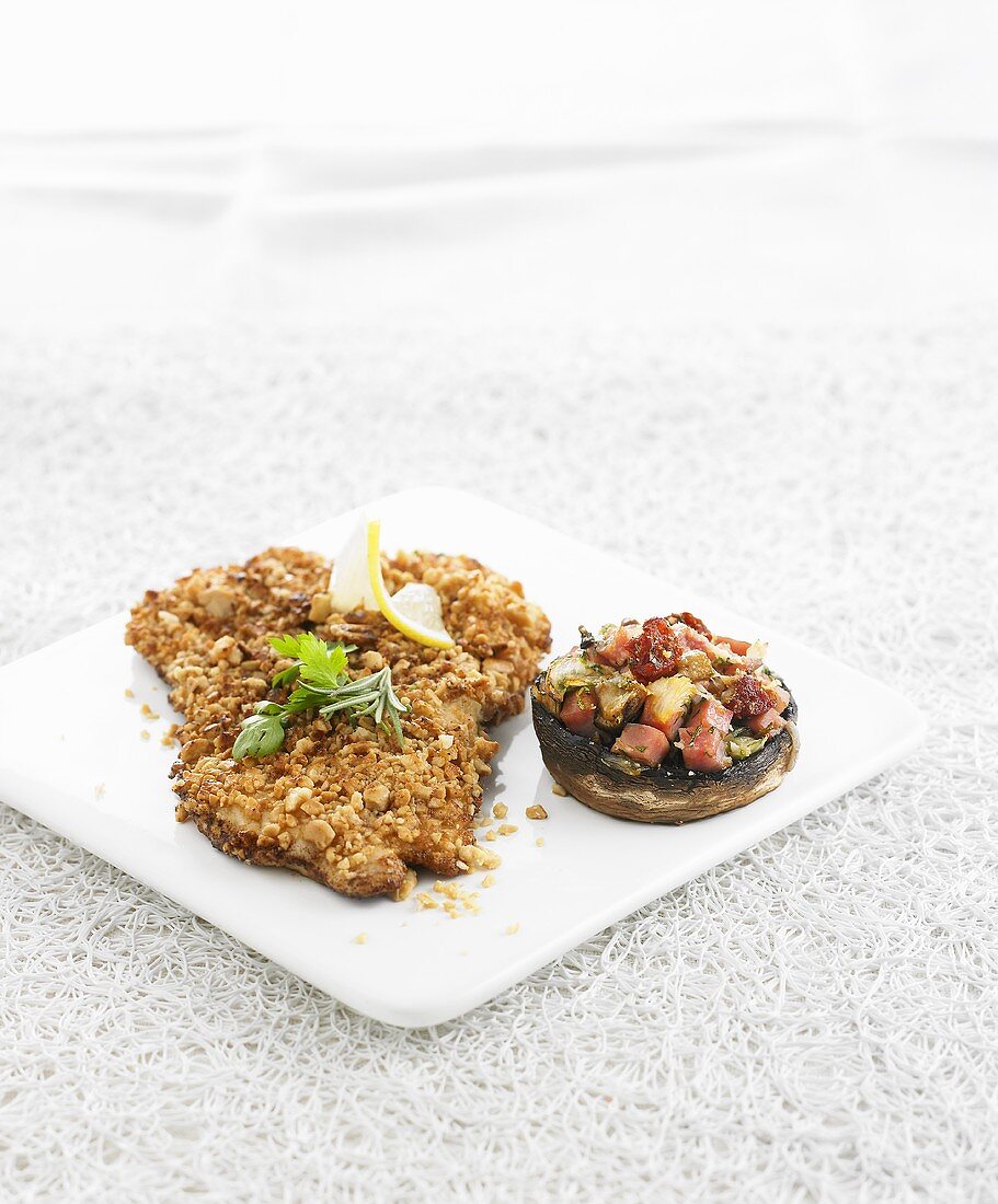 Fried turkey in peanut coating with stuffed mushroom