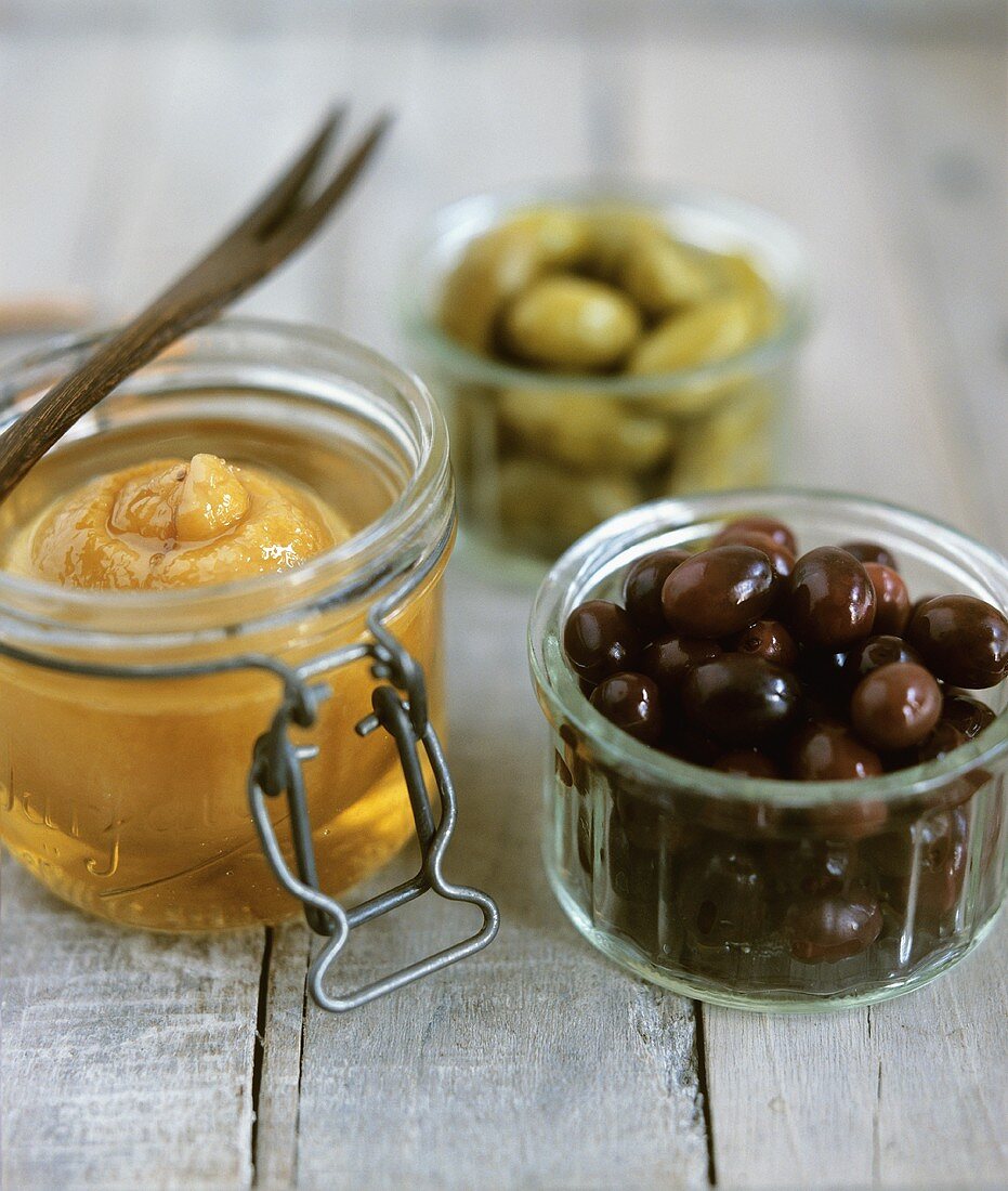 Pickled lemon and olives in preserving jars