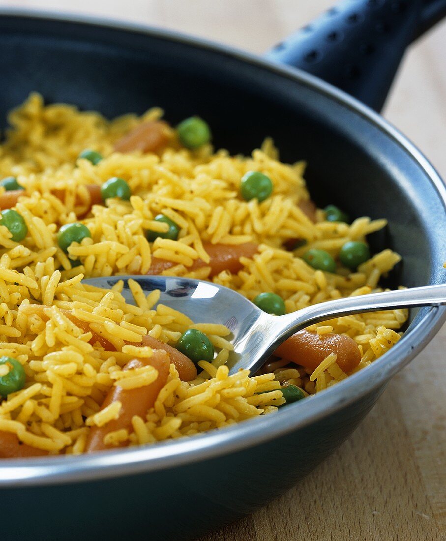 Saffron rice with carrots and peas