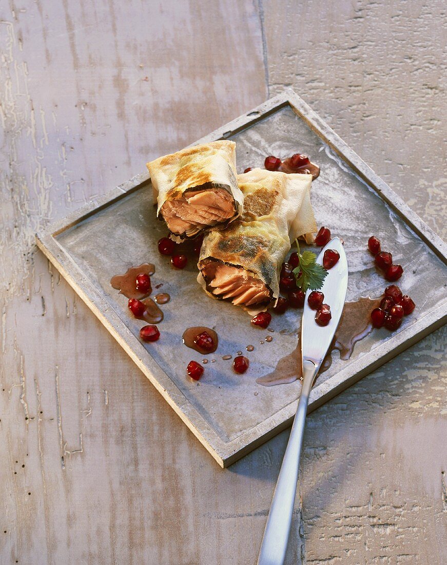 Salmon in filo pastry with pomegranate seeds