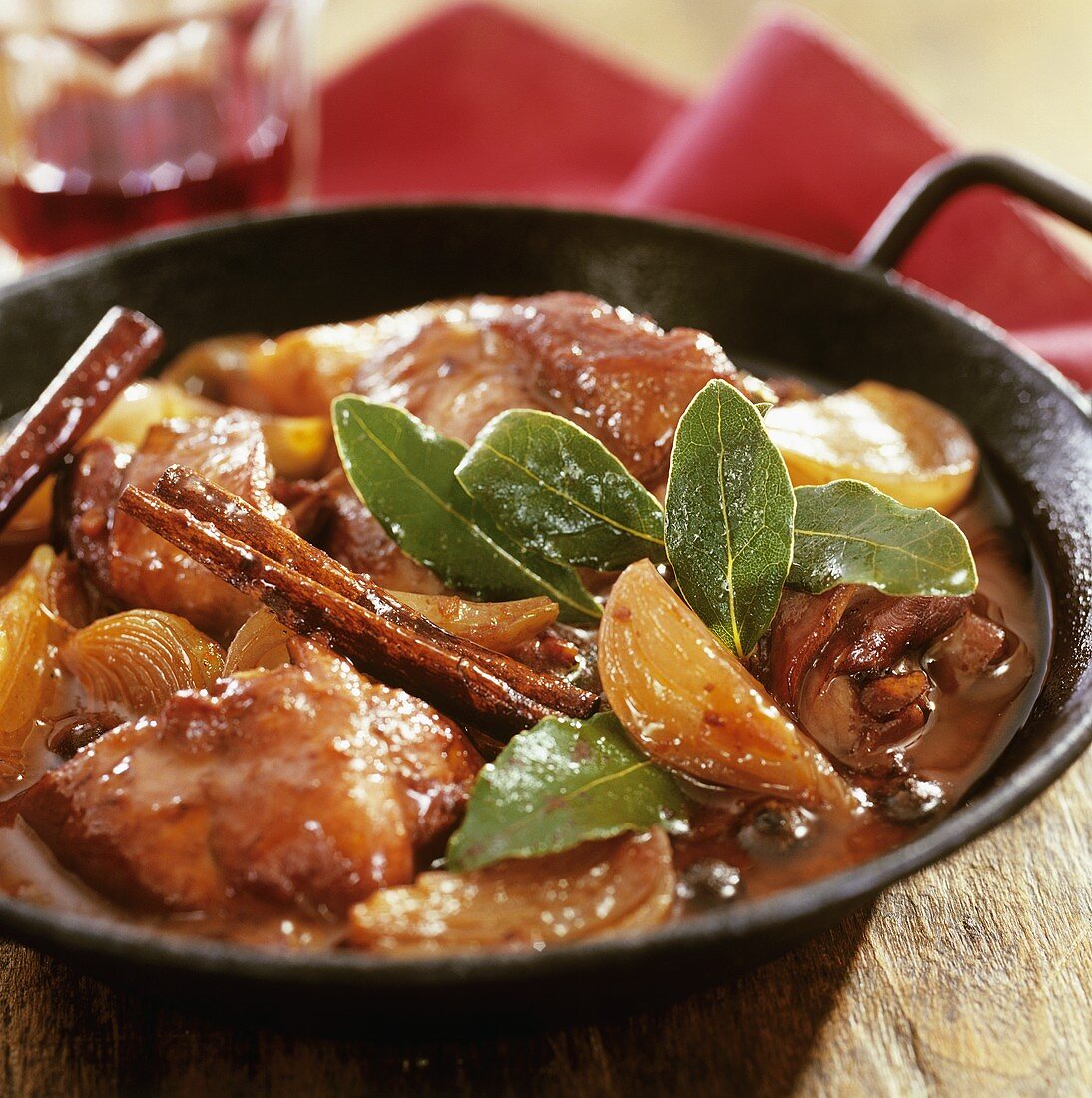 Pork stew with cinnamon and bay leaves