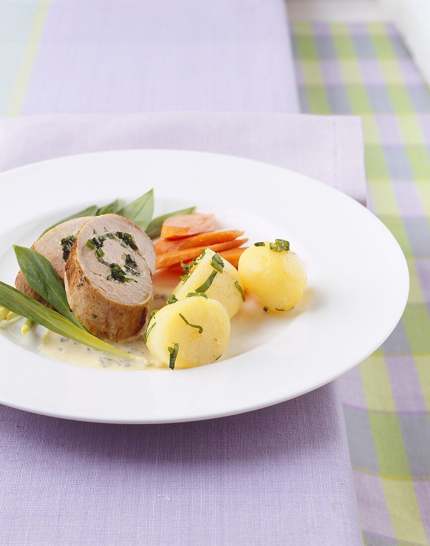 Pork roulade with ramsons (wild garlic) and vegetables