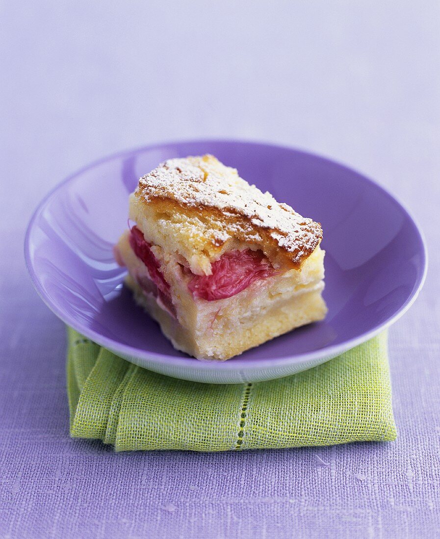 A portion of rhubarb bread and butter pudding