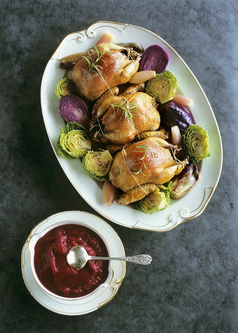 Stuffed quail on cabbage with beetroot puree