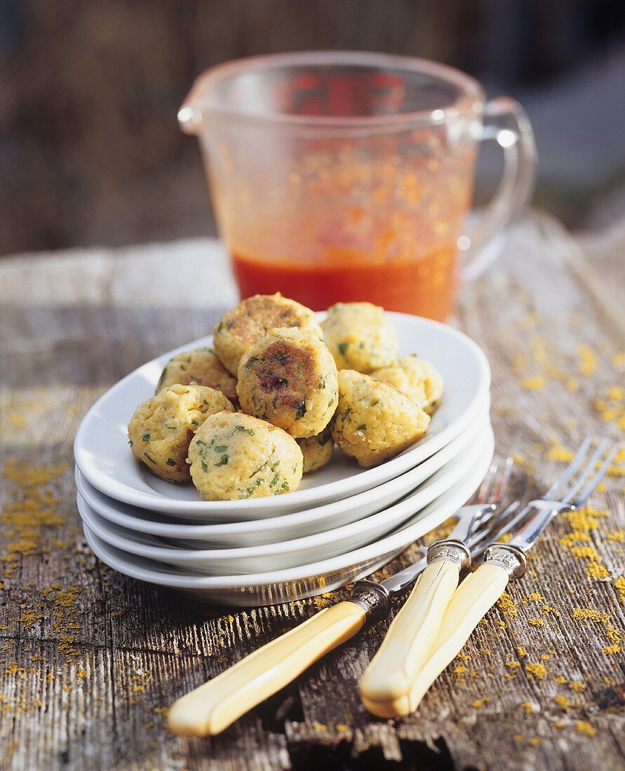 Sheep's cheese balls with tomato sauce