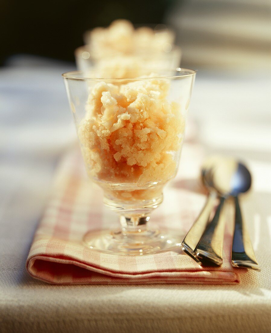 Orange and lemon granita in two glasses