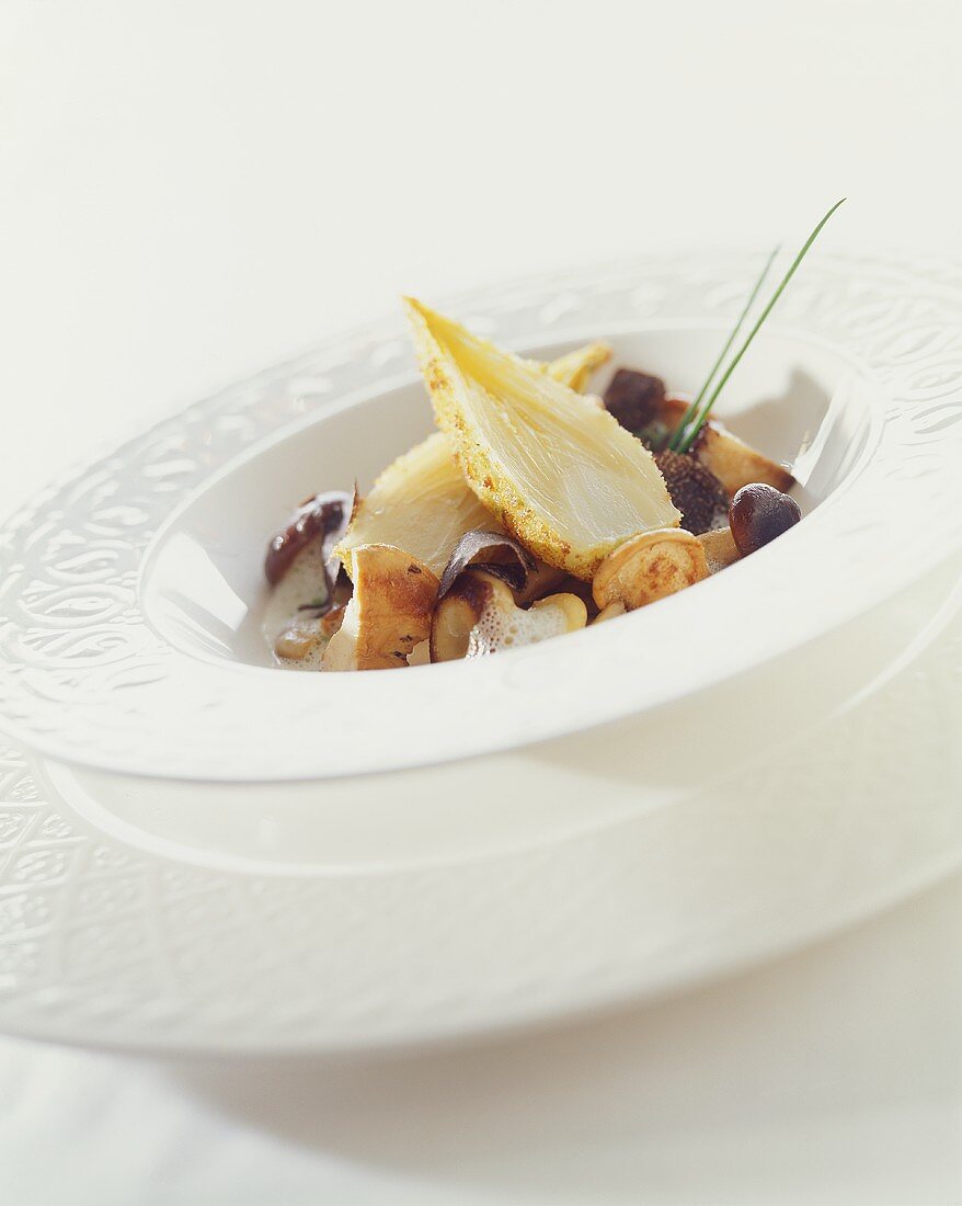 Breaded chicory with wild mushrooms and black truffles