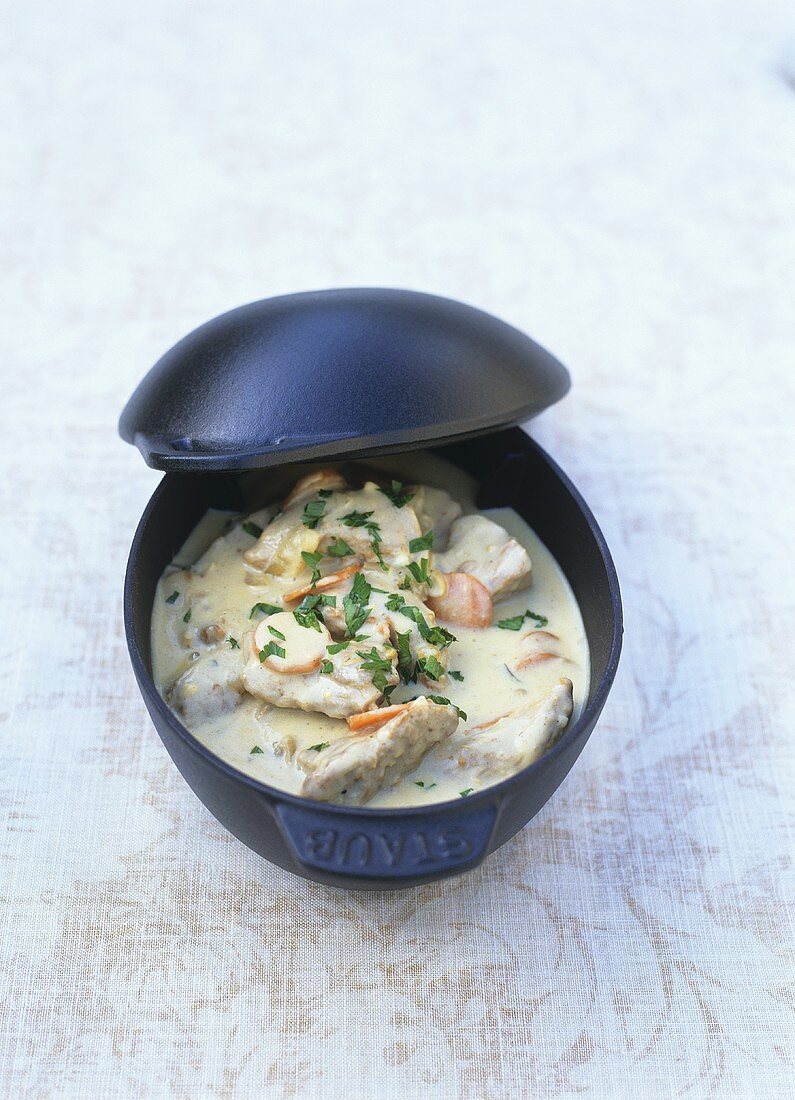Veal fricassee in a cast-iron pot