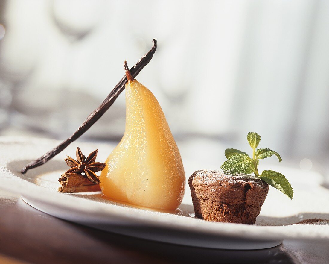 Spiced pear with a small chocolate pudding
