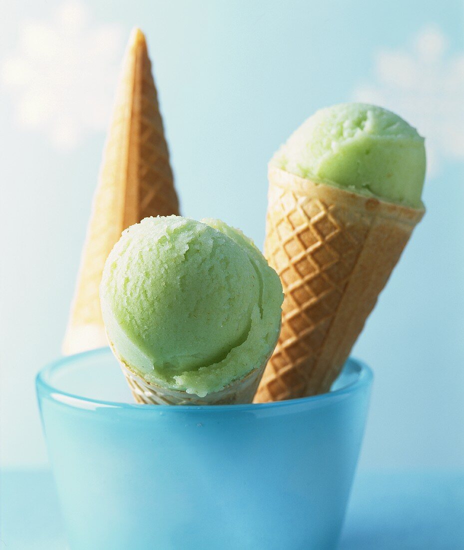 Mint ice cream in two ice cream cones