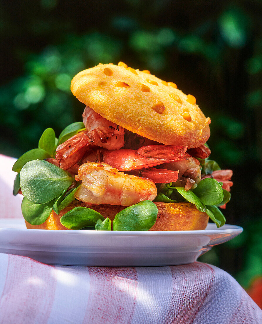 Prawn burger with corn salad