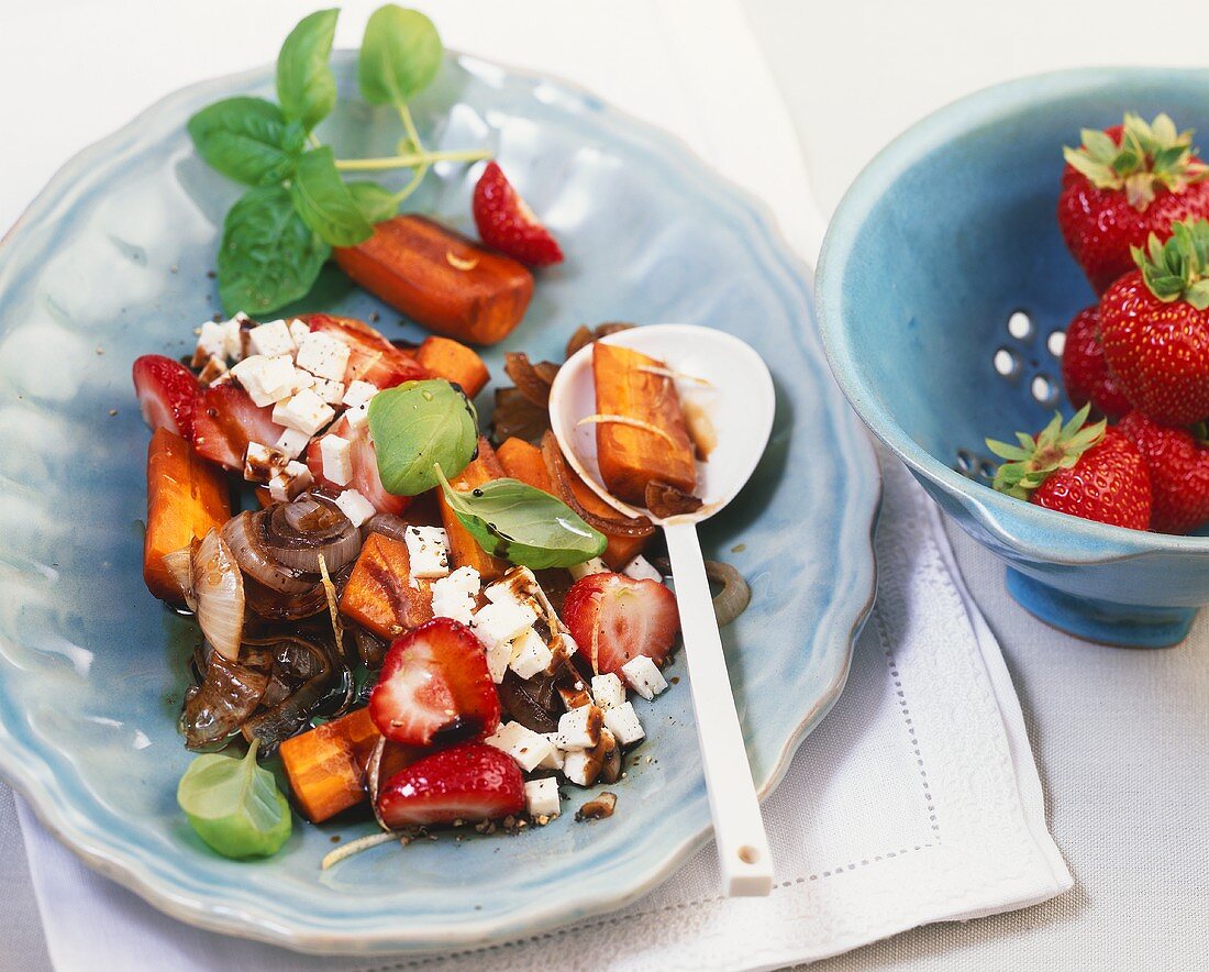 Carrot salad with strawberries, basil and feta