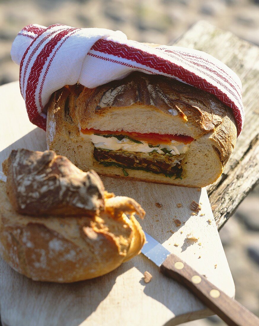 Stuffed picnic loaf with vegetable filling
