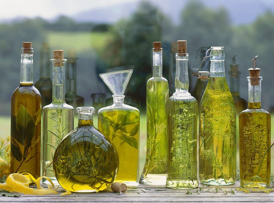 Various herb oils on a window sill