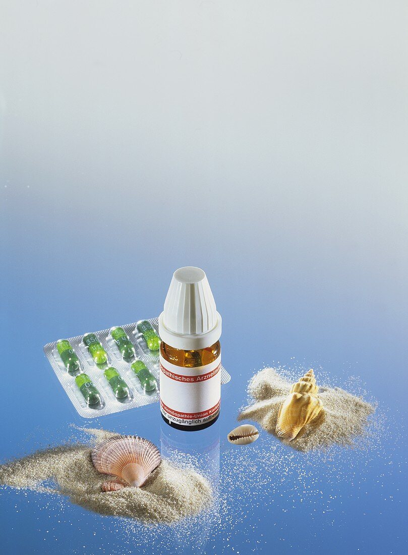 Homeopathic remedies, sand, shells