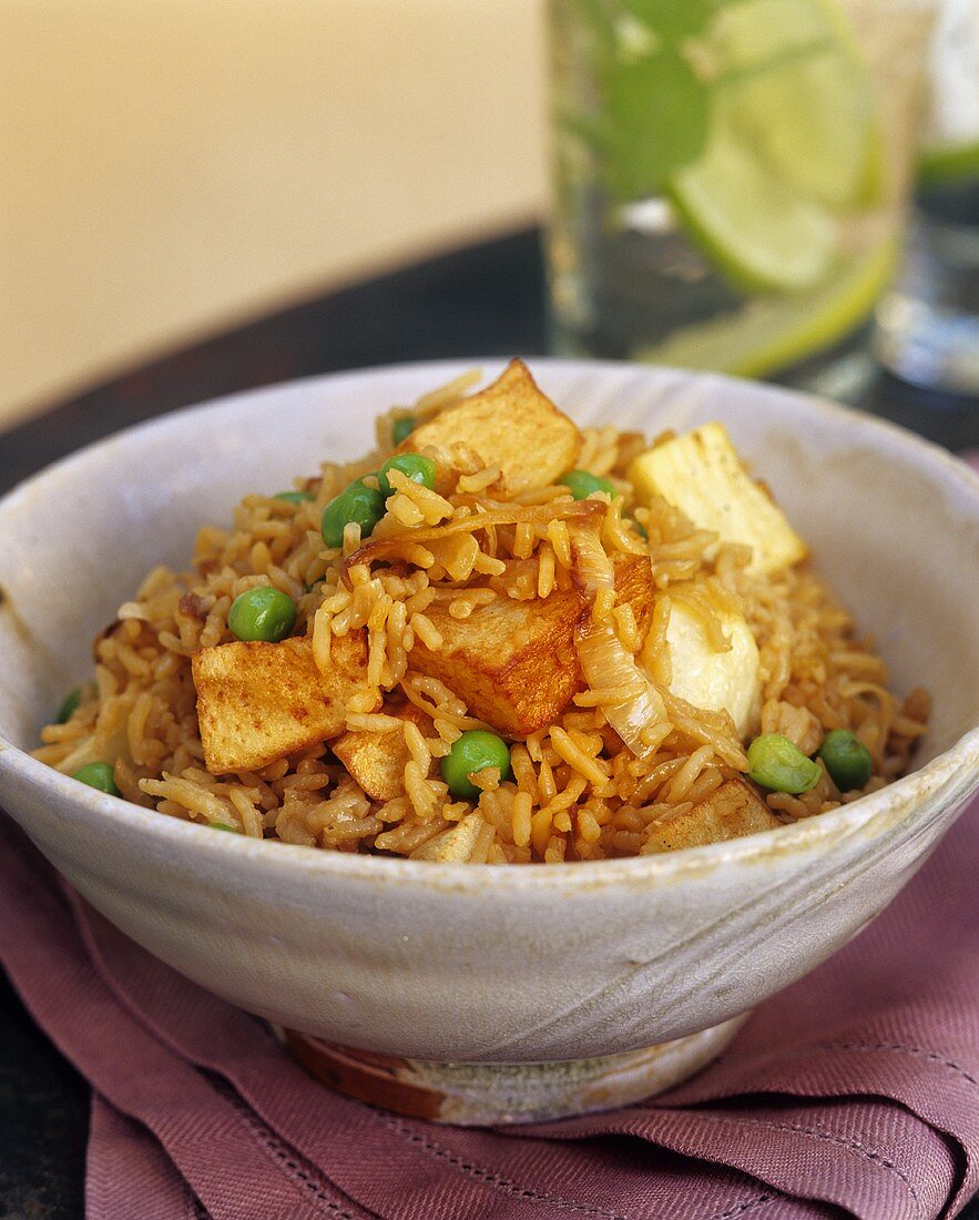 Fried rice with potatoes and peas