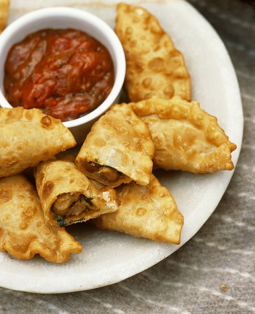 Deep-fried meat pasties with dip