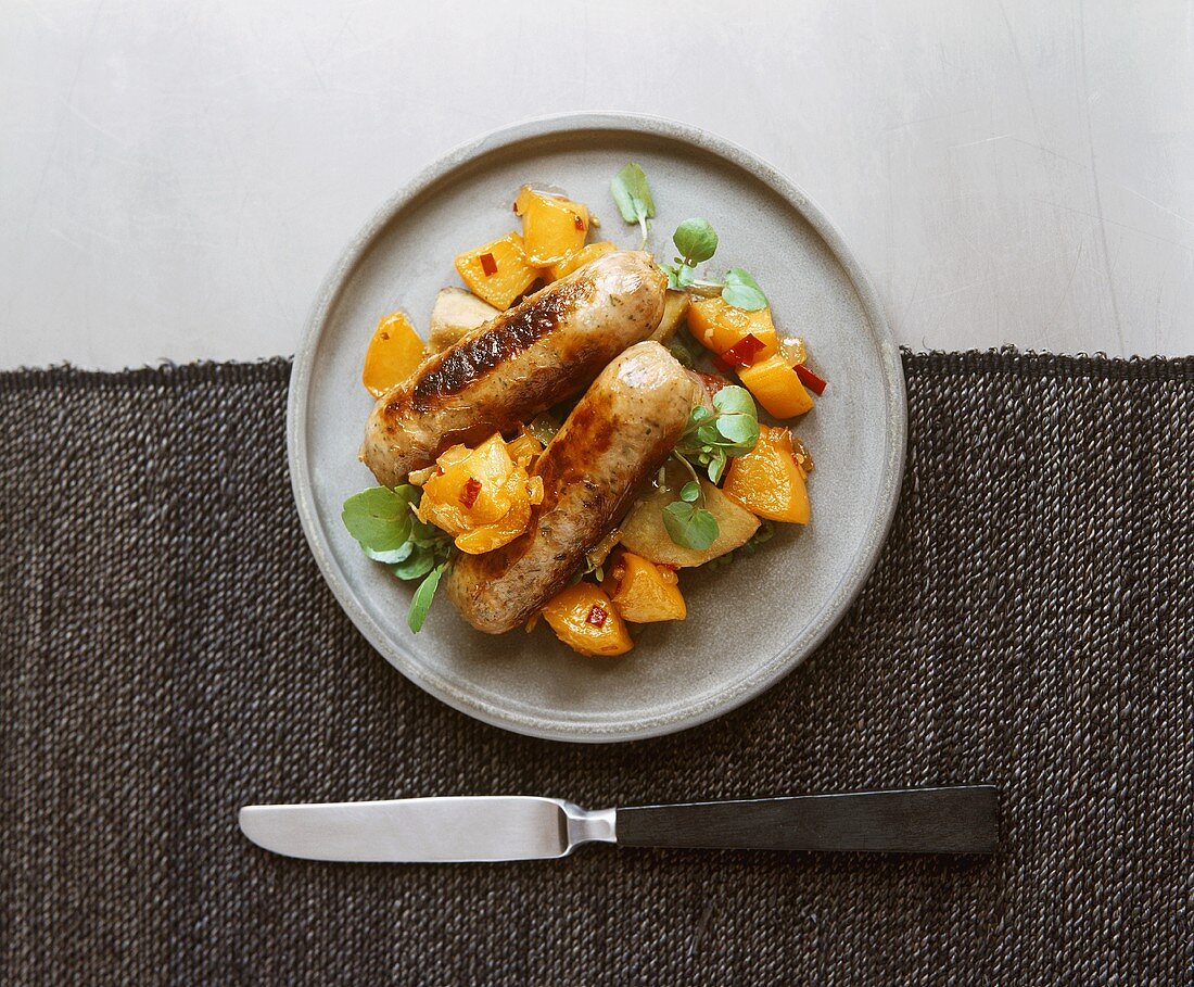 Sausages with peach chutney