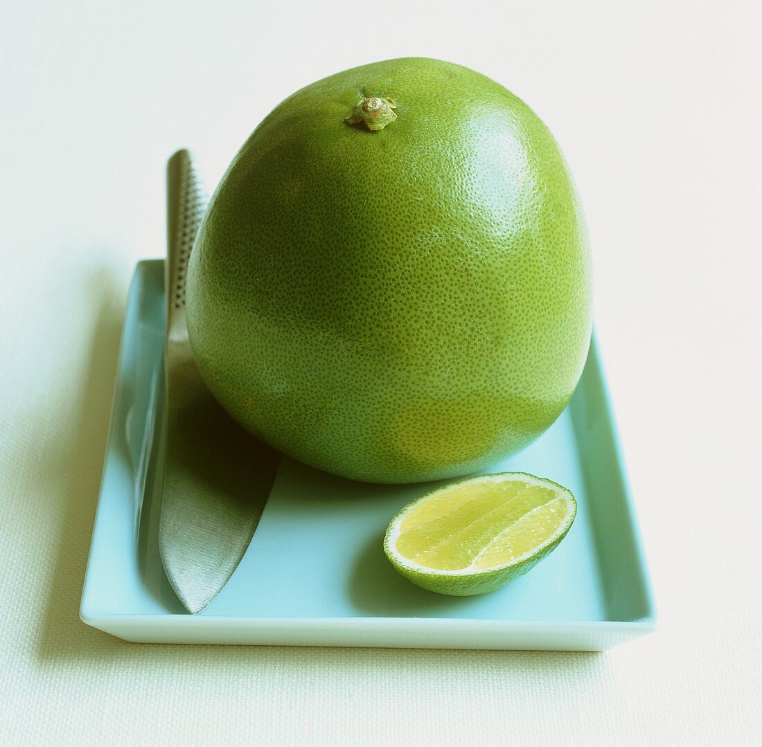 Pomelo and a piece of lime, Thailand