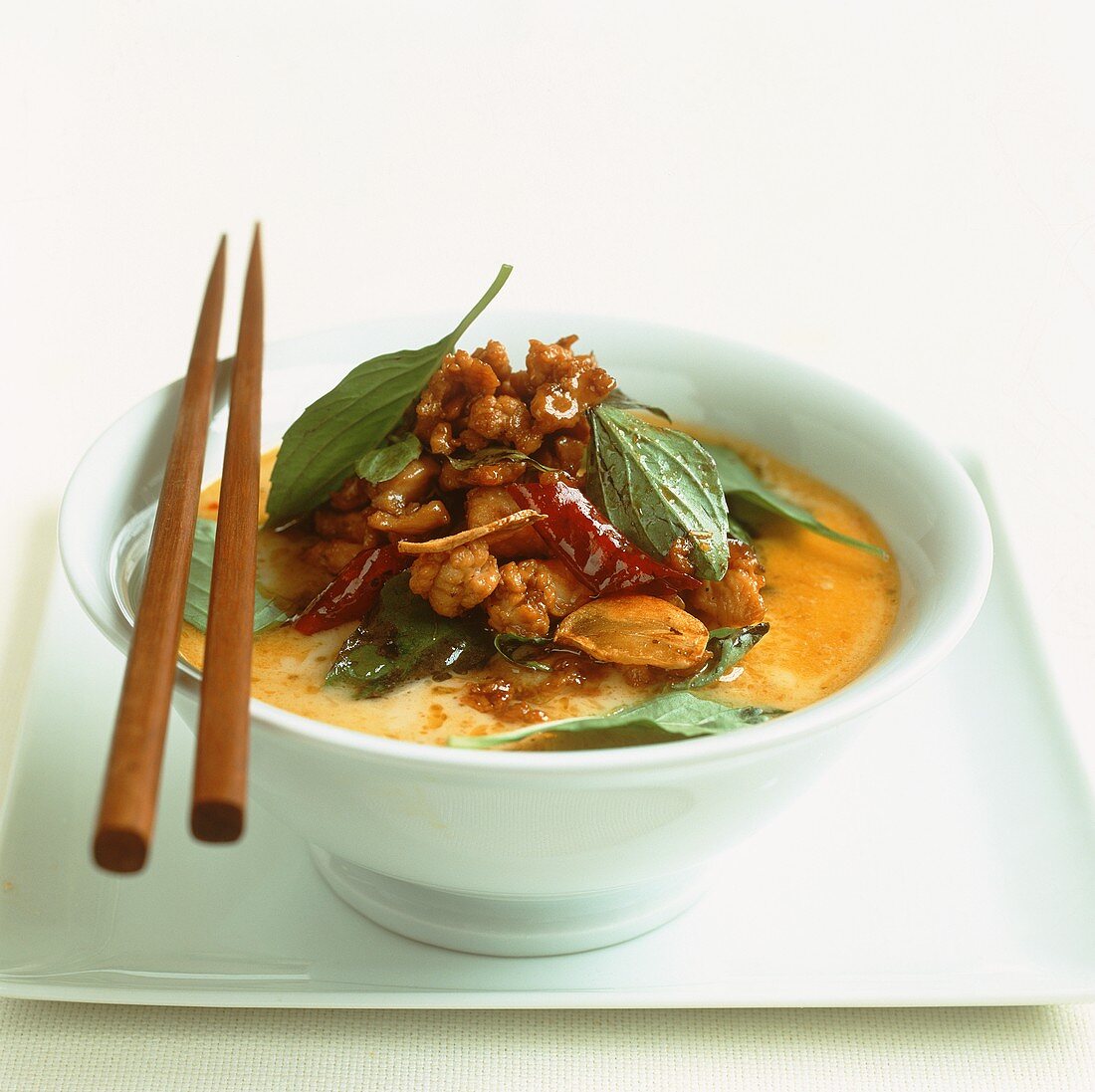 Yellow chicken coconut curry with Thai basil