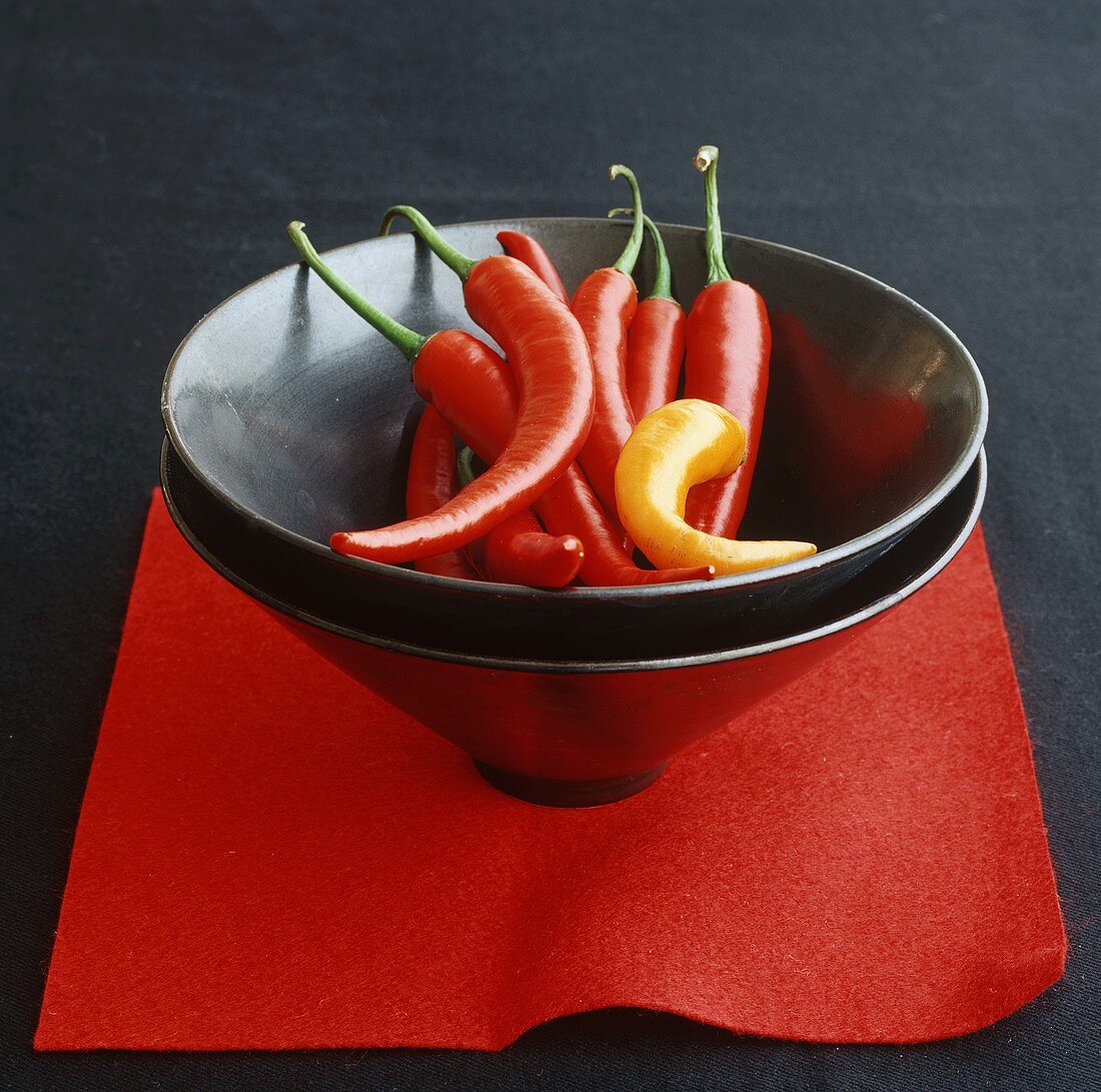 Red and yellow chillies in a dish