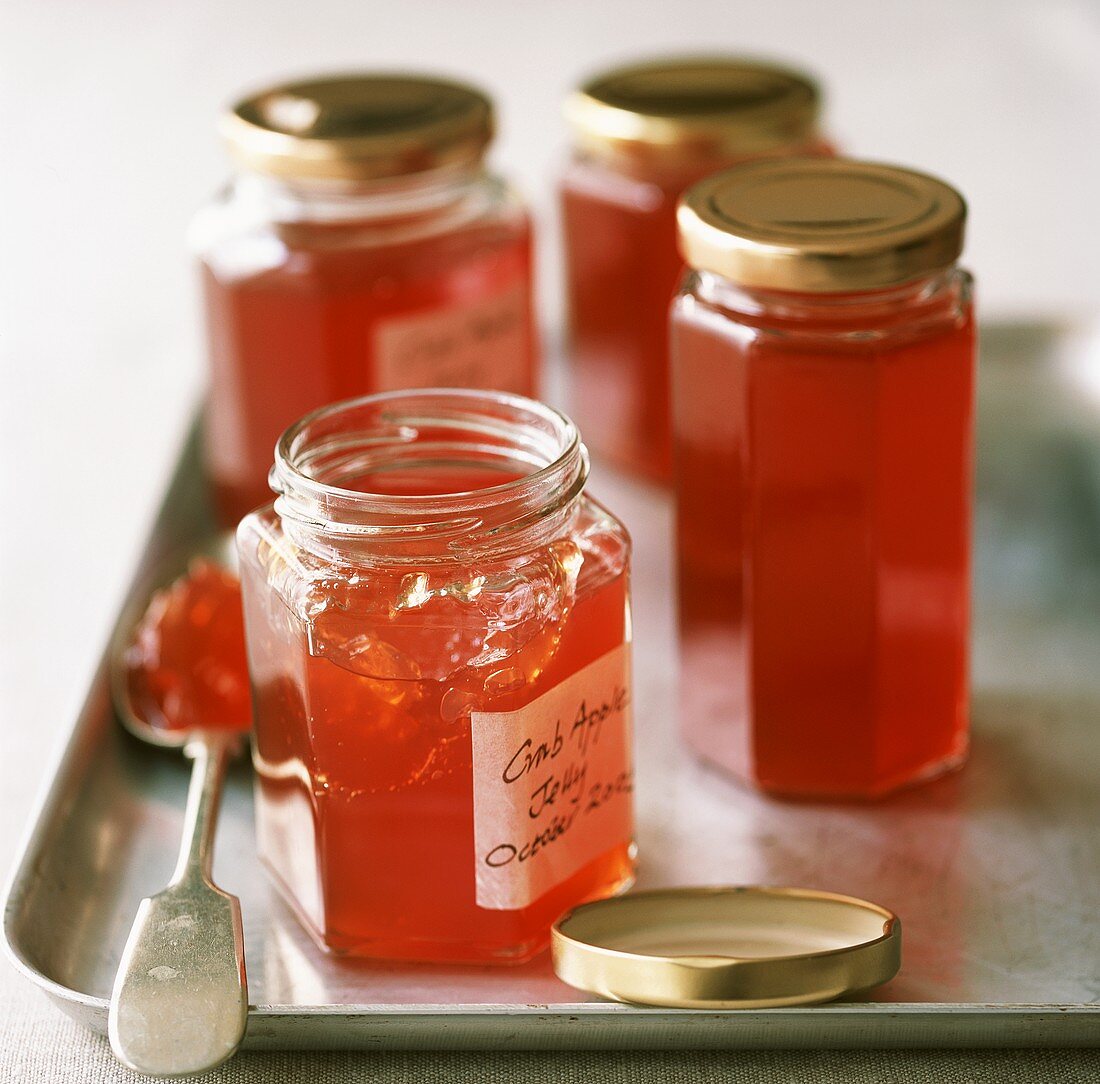 Four jars of crab apple jelly