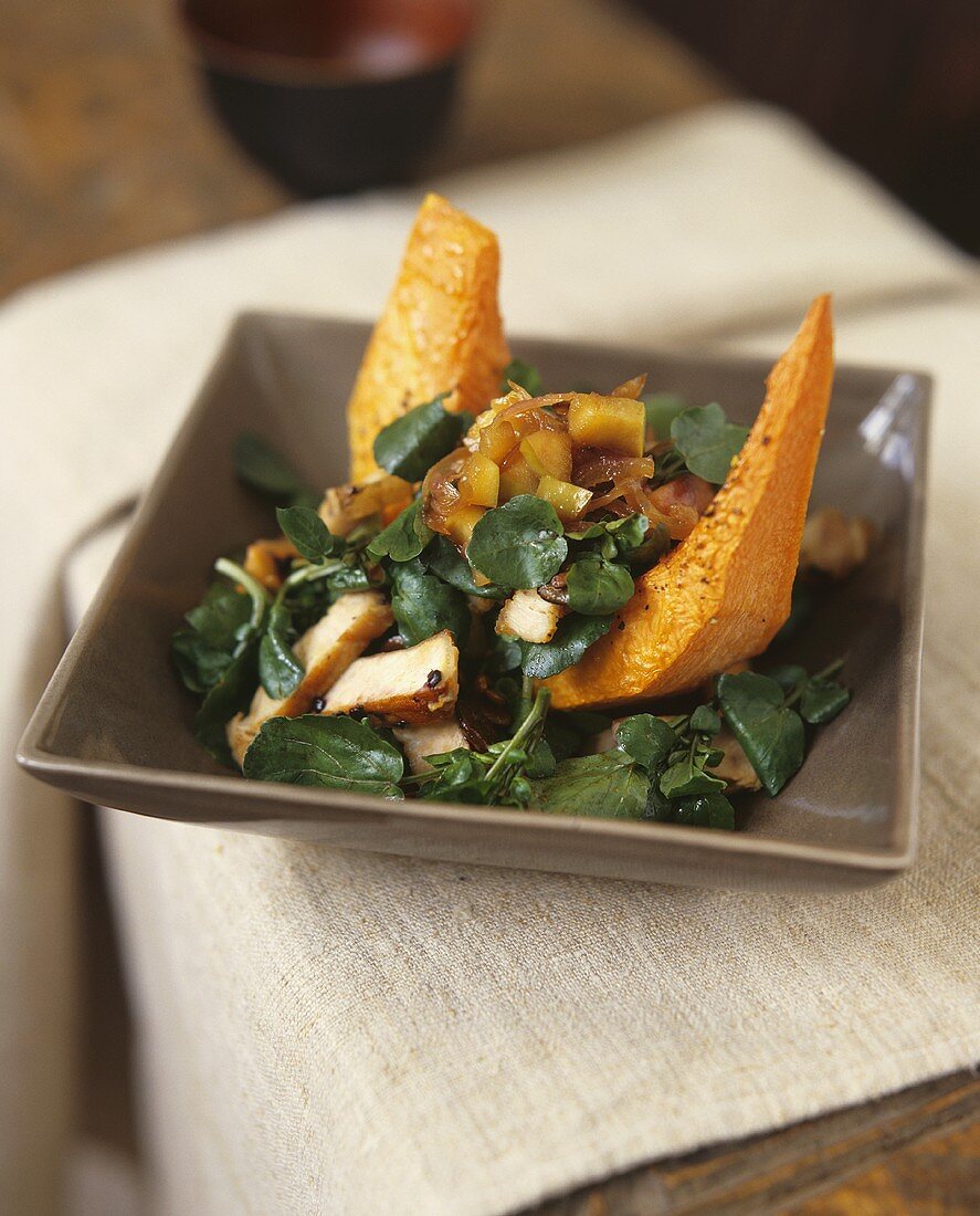 Water cress salad with pumpkin and fried chicken