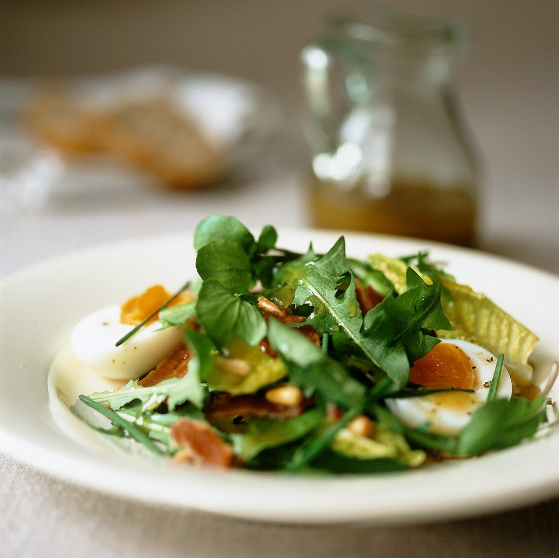 Dandelion salad with water cress, ham and egg